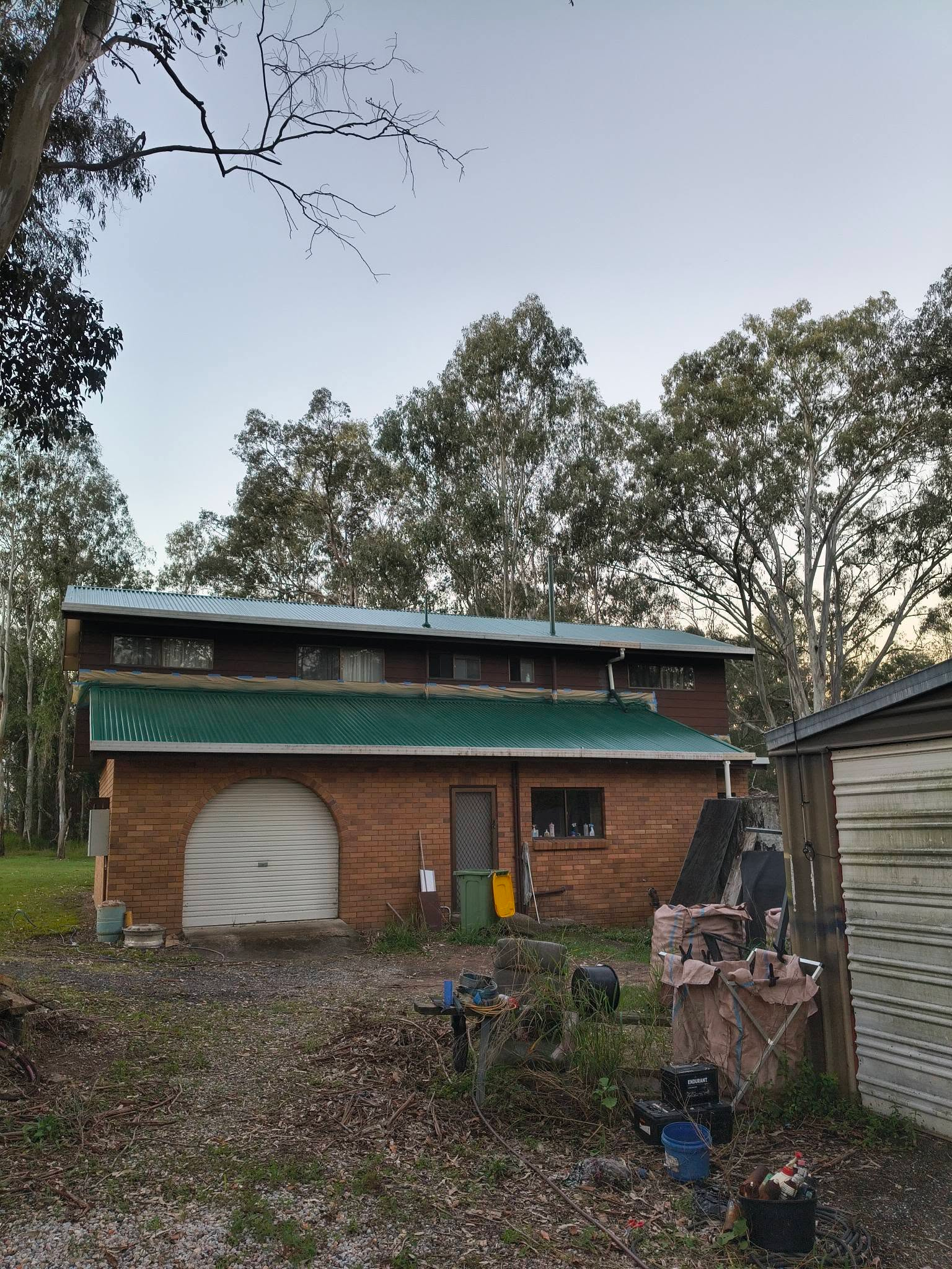 Chambers Flat home before the gutters and fascia were repainted Cottage Green